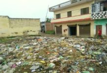 A pile of garbage in front of the post office in Harpalpur