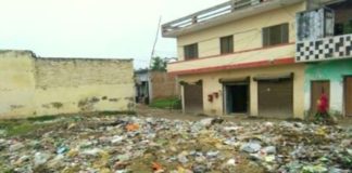 A pile of garbage in front of the post office in Harpalpur